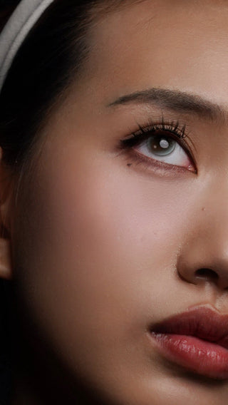 Model wearing Boardroom magnetic eyelashes showing a natural, professional daytime look — view 2